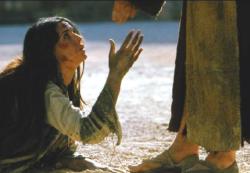 Sinful woman seeking Jesus' mercy